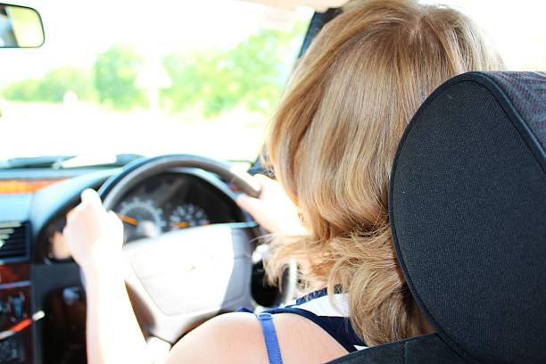 istock Woman is driving a car 501650517