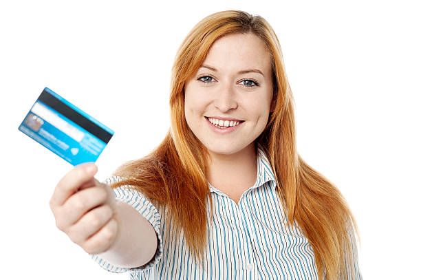 istock Young lady showing her cash card 501650875