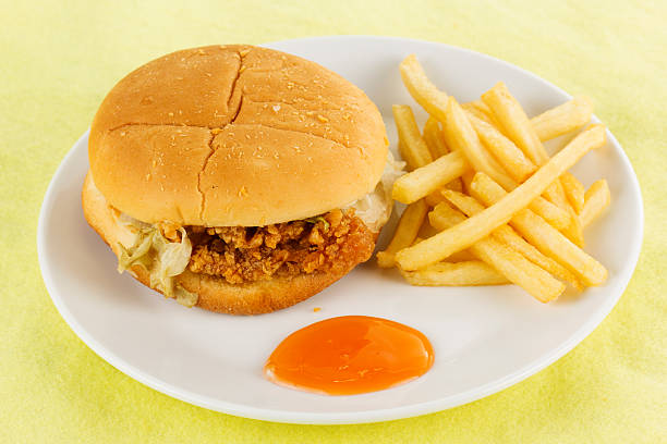 istock crispy chicken burger with french fried 501651549
