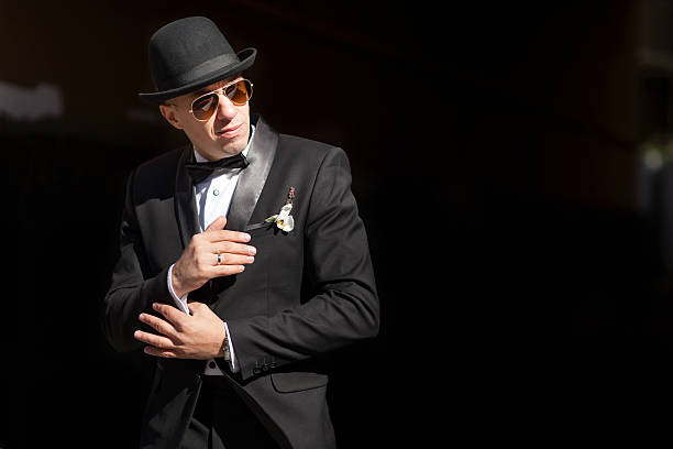 istock Man in tuxedo and hat 501651738