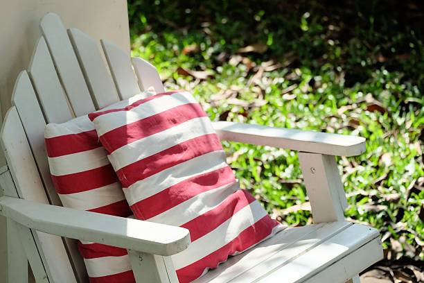 Relax white garden chair with two pillows