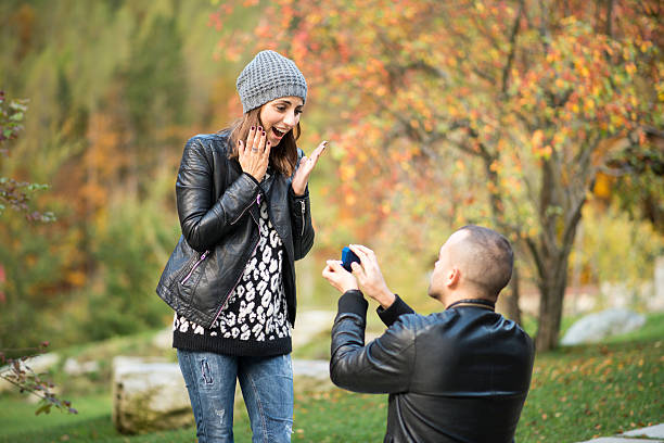 istock Autumn outdoor wedding proposal engagement 501654496