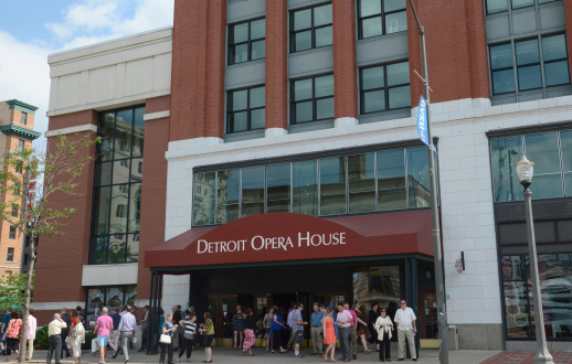 Detroit, MI, USA - July 6, 2014: Patrons exit a matinee performance at the Detroit Opera House in Detroit, MI on July 6, 2014. The Michigan Opera Theater is housed as the Opera House.