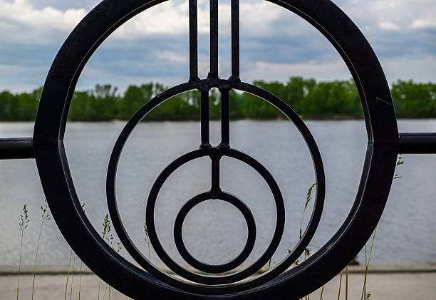 istock Round fence, river and sky 501667088