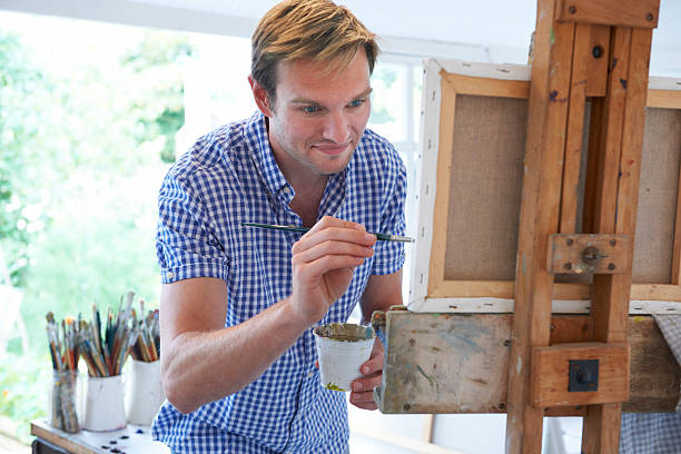 istock Male Artist Painting In Studio 501668111