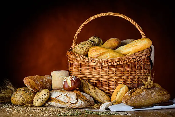Basket of bread and buns in traditional still-life