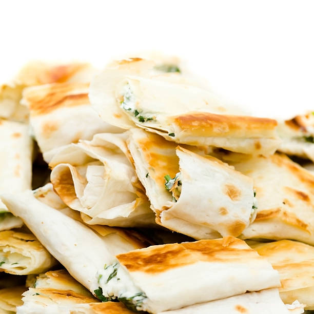 istock Fresh sandwich appetizers closeup. Small lavash rolls. 501671411