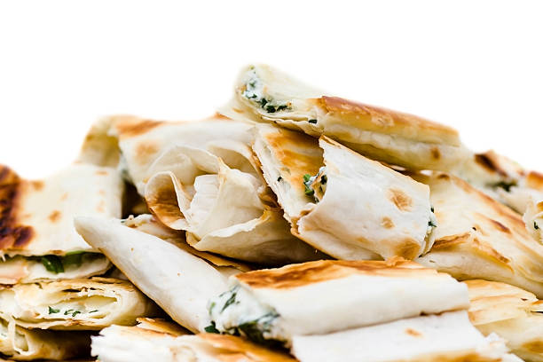istock Fresh sandwich appetizers closeup. Small lavash rolls. 501671413