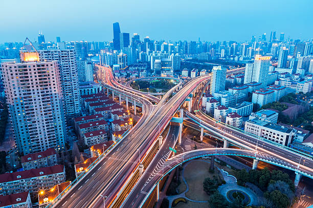 istock aerial view of beautiful city interchange in nightfall 501671421