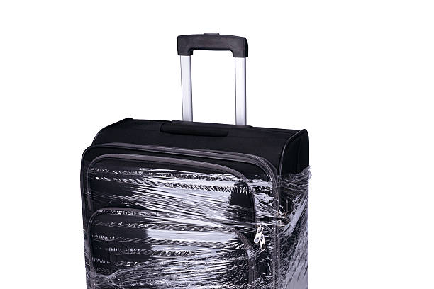 Plastic Wrap Luggage Stock Photos, Pictures & Royalty-Free Images - iStock