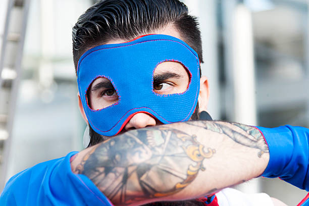 istock portrait of young hipster superhero 501672780