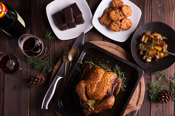 Christmas and new year's eve dinner: roasted whole chicken stock photo