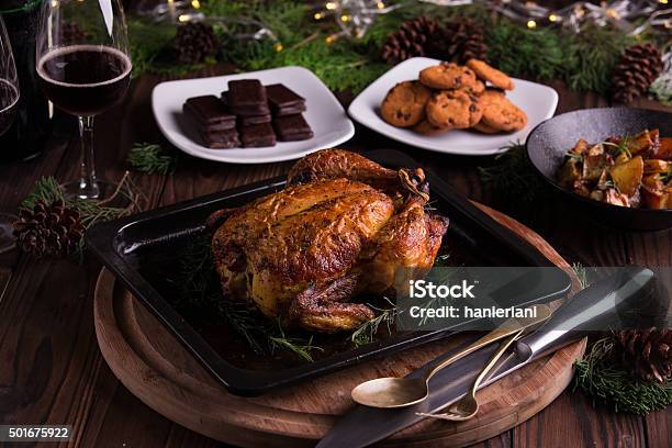 Christmas And New Years Eve Dinner Roasted Whole Chicken Stock Photo - Download Image Now