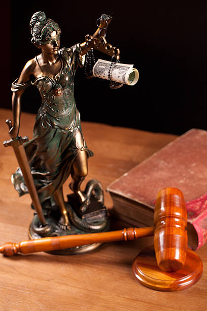 istock judge gavel with money closeup 501677702