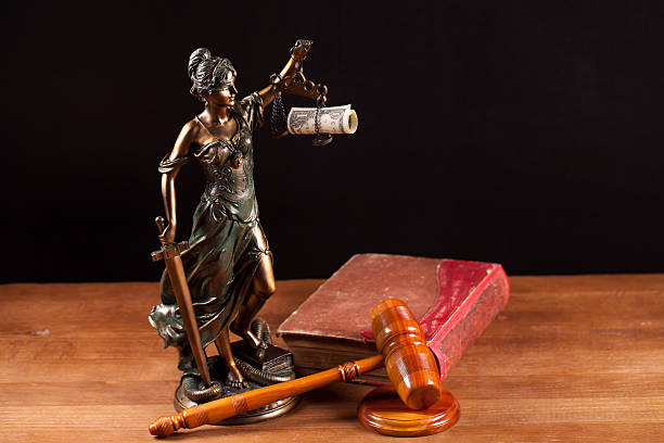 istock judge gavel with money closeup 501678154