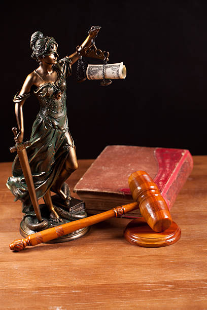 istock judge gavel with money closeup 501678194