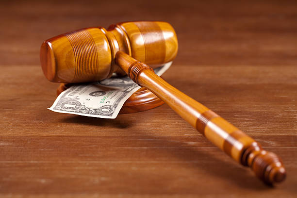 istock judge gavel with money closeup 501679034