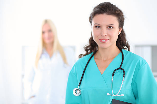 istock Beautiful young smiling female doctor 501680424