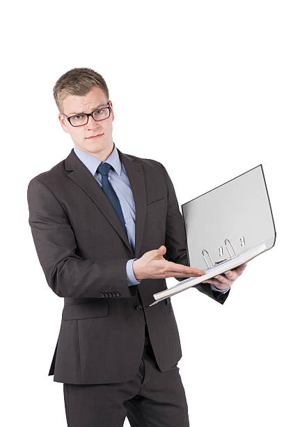 istock Young dissatisfied man is pointing to a file 501685839