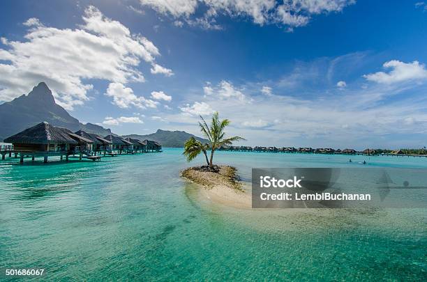 Overwater Bungalows In Pacific Stock Photo - Download Image Now - Bora Bora, Blue, Bungalow