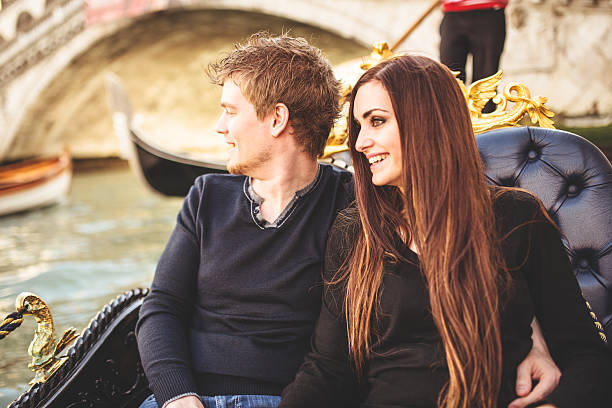istock romantic couple togetherness on the gondola in venice 501691321
