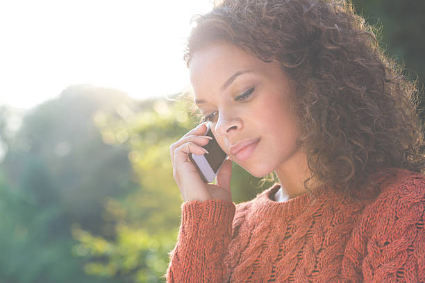 istock Mixed Race Woman Using Smartphone 501691403