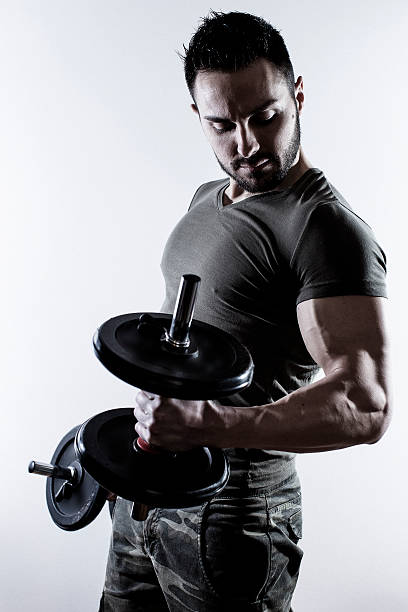 bodybuilder - human muscle flash стоковые фото и изображения
