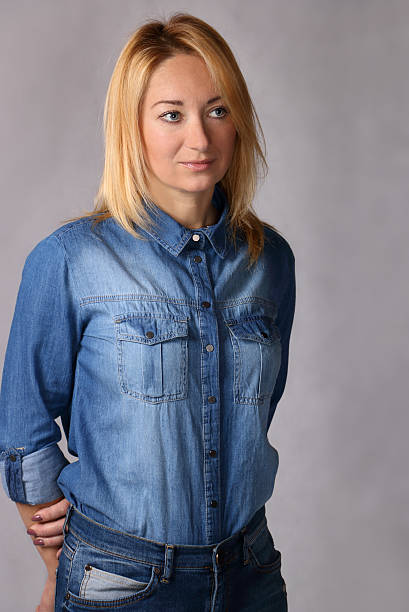 istock woman in a denim shirt 501702790