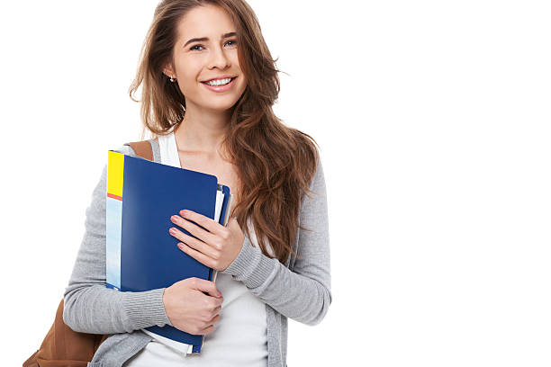 istock Young happy student with books isolated. 501702952