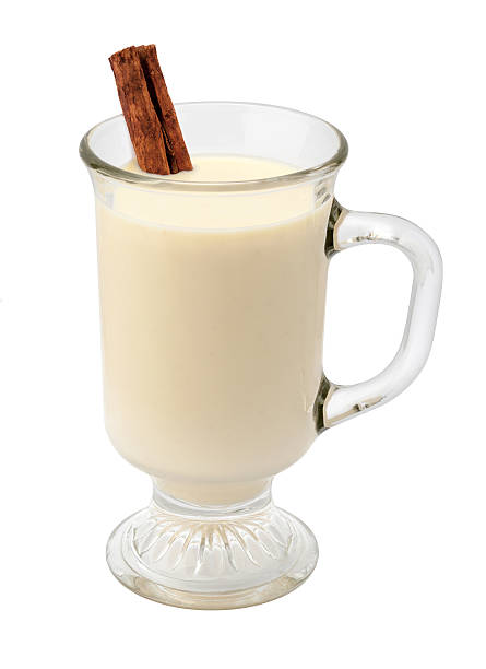 Eggnog With Cinnamon In A Glass Cup Stock Photo - Download Image Now -  Eggnog, Cut Out, White Background - iStock