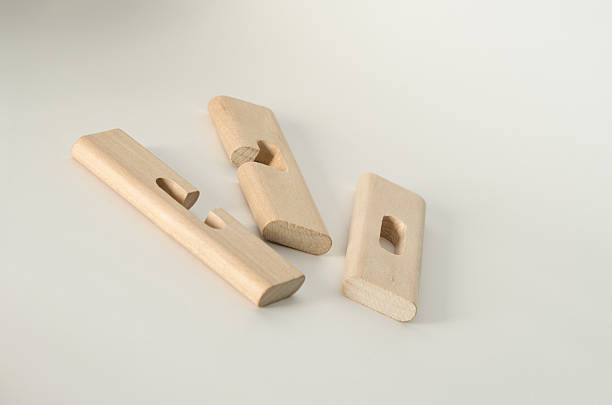 istock Three Pieces Wooden Puzzle Disassembled 501706528