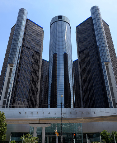 Detroit, MI, USA - July 6, 2014: The Renaissance Center, shown here from Jefferson Avenue in downtown Detroit on July 6, 2014, houses the world headquarters of General Motors.