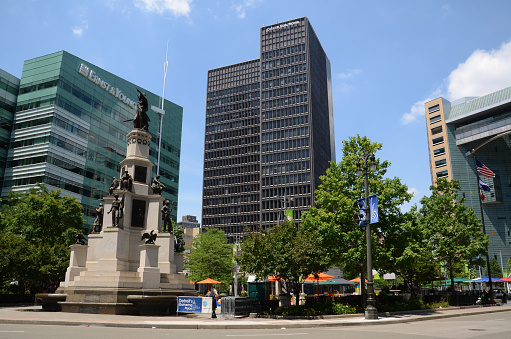 Detroit, MI, USA - July 6, 2014: The revitalized Campus Martius park, whose Soldiers and Sailors monument is shown here on July 6, 2014, was dedicated in 2004 as part of the renewal of Detroit.