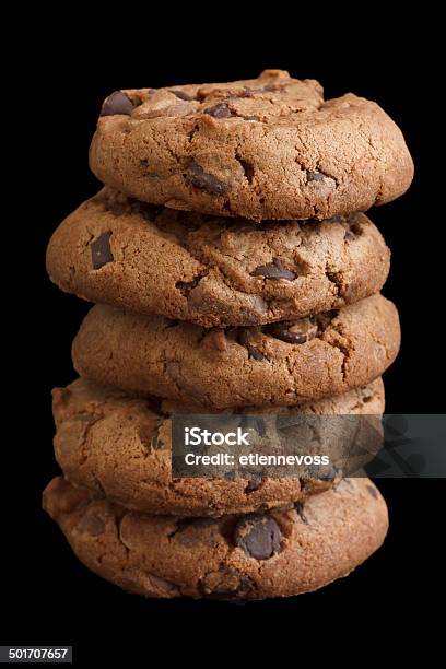 Stack Of Chocolate Chip Cookies Isolated On Black Stock Photo - Download Image Now - Arranging, Black Color, Brown