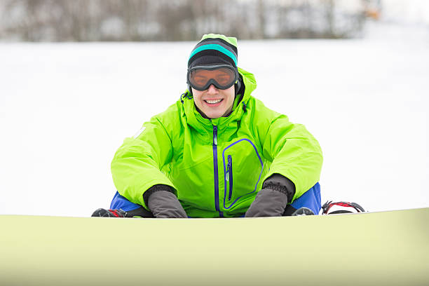 istock Young Adults Skiing and Snowboarding snow play in Winter 501708651