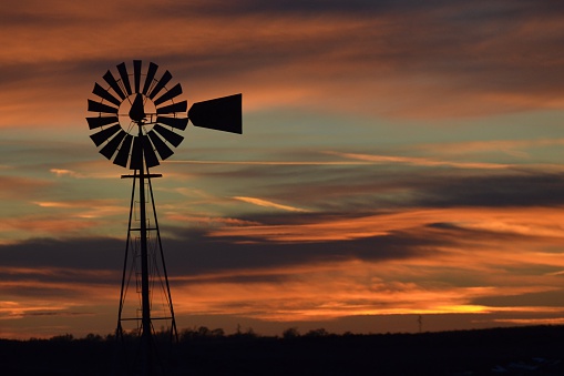 This windmill sits in a pasture about halfway between Imperial and Grant, NE. I love the way it looks in the sunset!