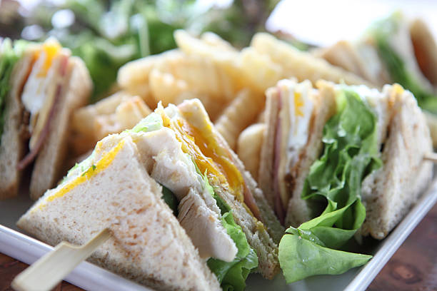istock Club sandwich with on wood background 501710329