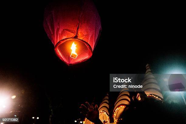 Fire Lantern Being Released Stock Photo - Download Image Now - Balloon, Hot Air Balloon, Releasing