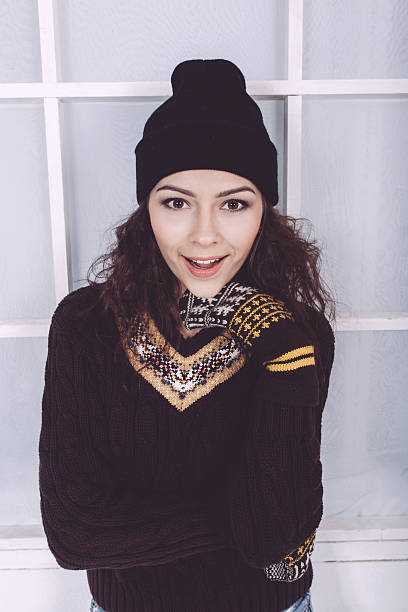 istock Cute girl in winter outfit posing for the camera 501712268