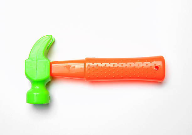 Colored plastic carpenter toys stock photo