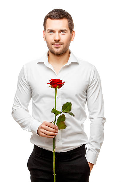 Young man carries flowers isolated on white