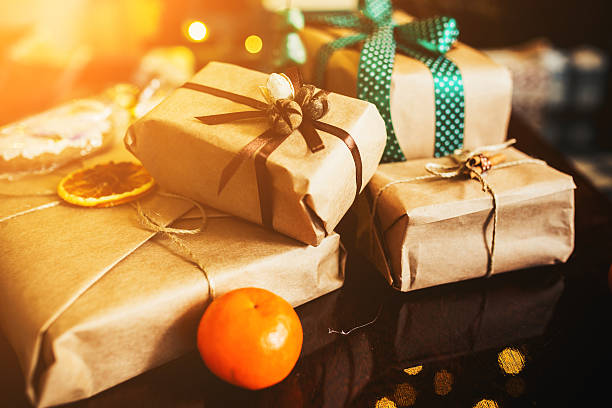 istock Gifts lie on wooden table 501712510