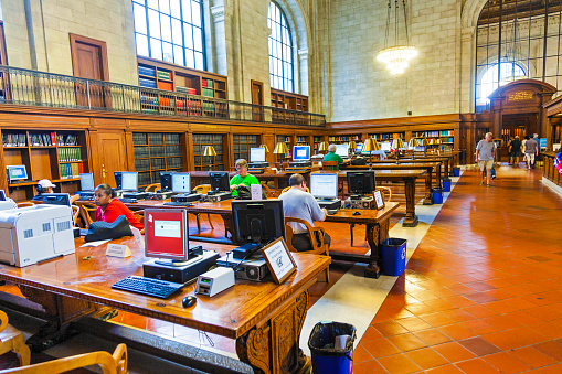 New York, USA - July 10, 2010: people study in the New York Library in New York, USA. New York Public Library is the third largest public library in North America.   