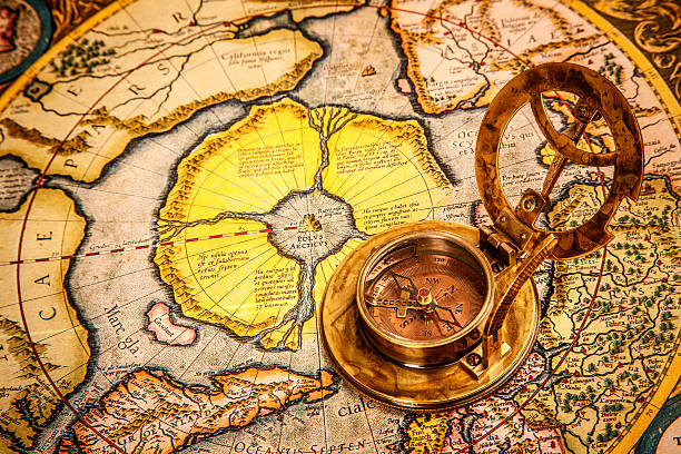 istock Vintage compass lies on an ancient world map. 501713179