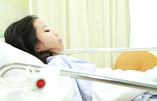istock Patient on hospital bed 501713271