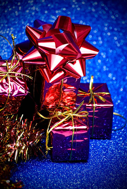 istock Christmas gifts with a lighted candle 501715874