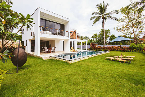 istock Luxury villa with swimming pool outside exterior view 501716012