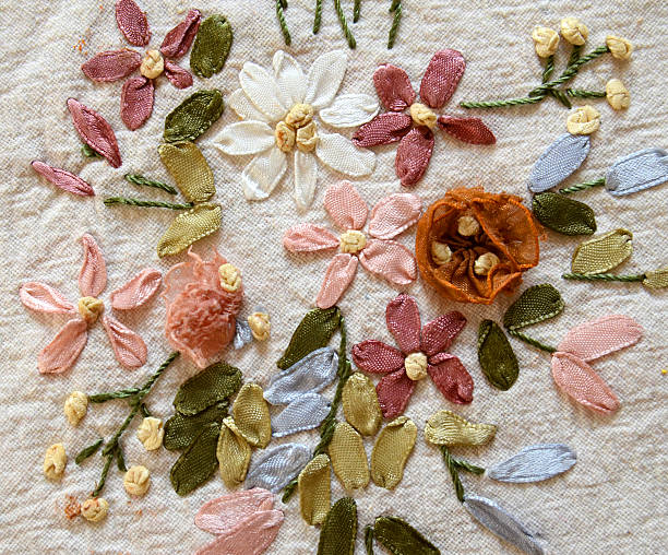 istock embroidery flowers on a fabric 501716048