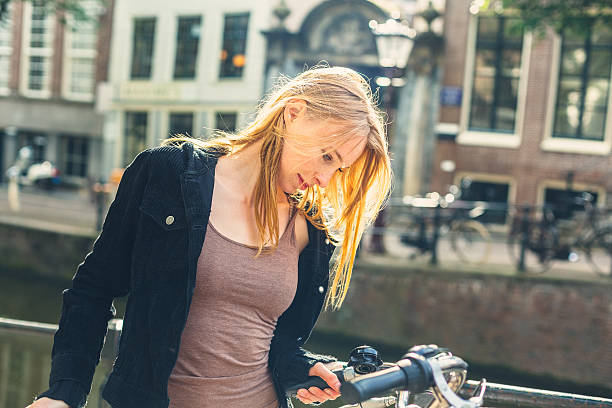 istock Dutch woman with bike 501731111