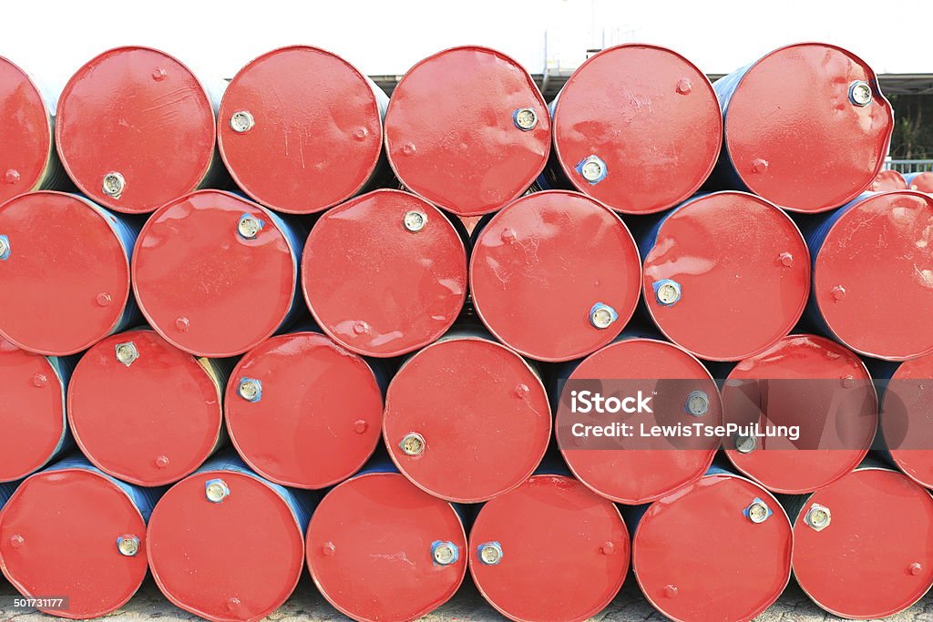 old red barrell in hong kong china old red oil barrell in the dock  in hong kong china Oil Drum Stock Photo